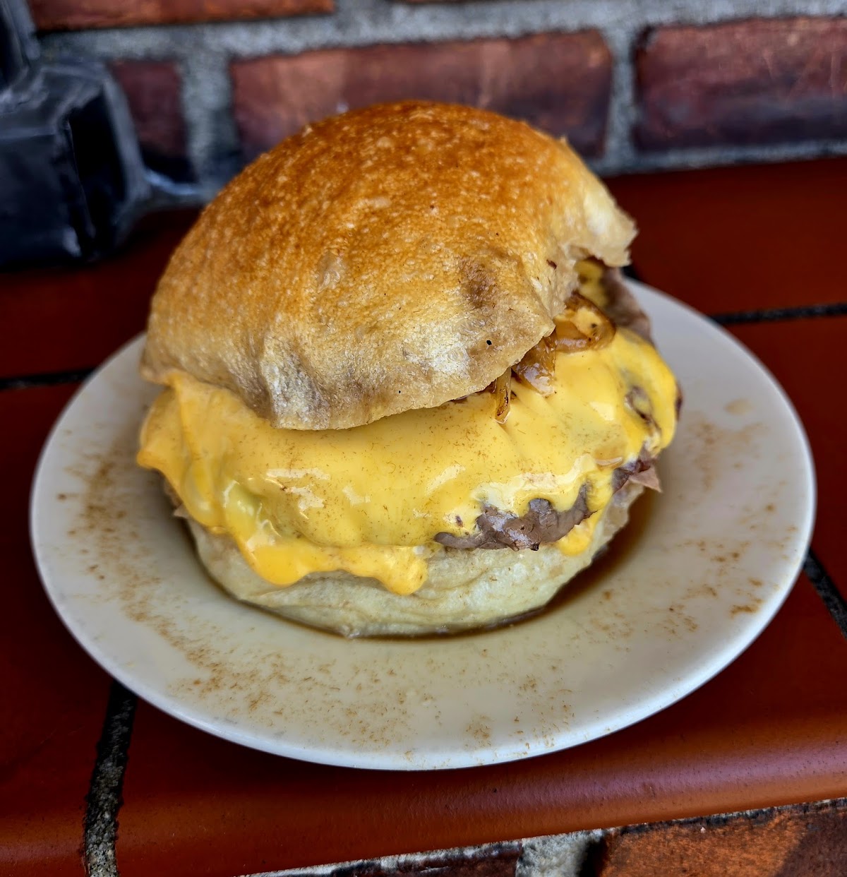 The signature roast beef sandwich with melted cheese at Brennan & Carr